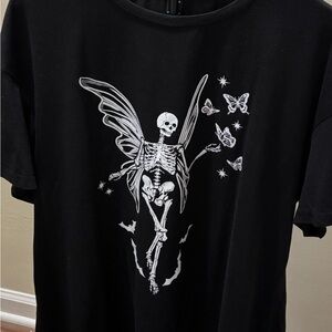 SHEIN Unisex T-shirt features a Gothic angel skeleton and butterfly graphic.